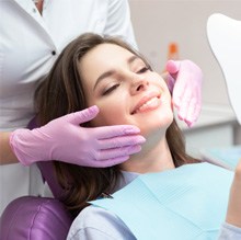 Woman seeing a dentist for a checkup 